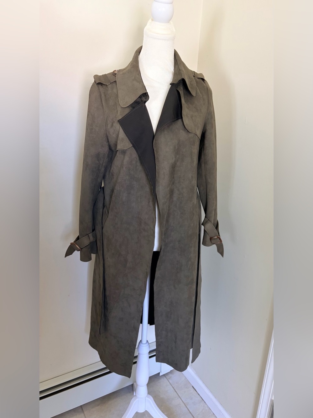 Faux-suede trench coat features a dark green with a belted